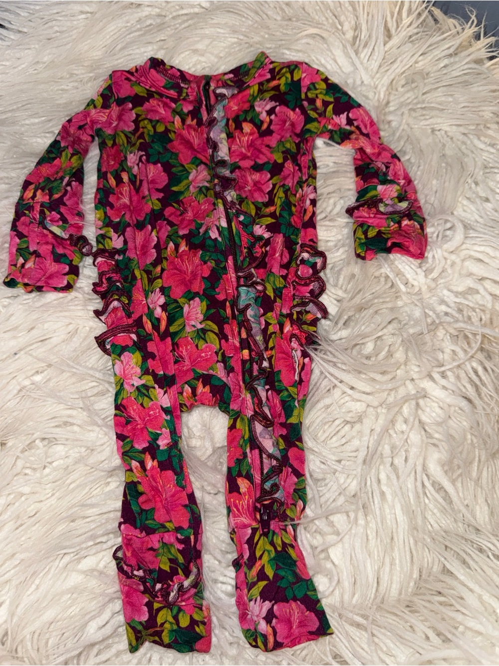 Floral Pink Snap-Front Baby Onesie with Green Leaf Print